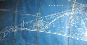 Blueprint showing lakeshore, roads, trees, insdustrial areas, meadow and a lagood. Shows Andes stove plant.