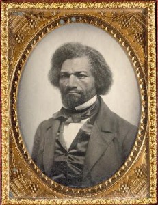 Distinguished bearded African-American man in a jacket, waistcoat and cravat.