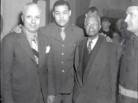 Joe Louis with two other men