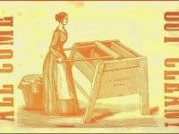 Print of a woman at an antique washing machine with the words: All Come Out Clean!