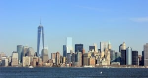 Colored photograph of lower Manhattan Skyline and Freedom Tower-across-water-photo-by-lesekreis