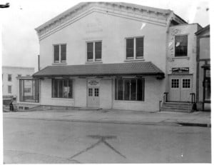 Black and white photo of the Geneva Civic Center in disrepair