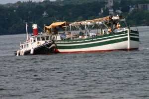Colored photo of two boats on Seneca Lake