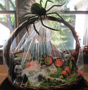 basket filled with Halloween items