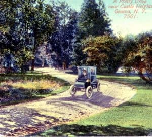 Postcard of a Model T driving near Castle Heights in Geneva.