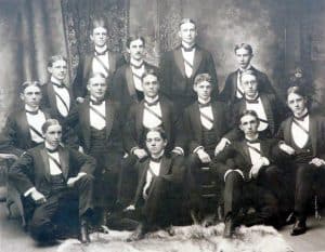a group of gentlemen in tuxedos