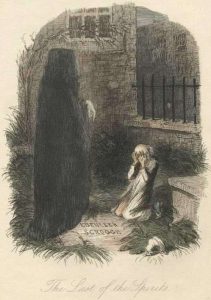 A man kneeling in front of a cloaked figure