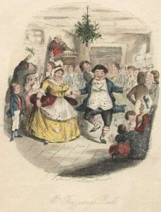 people in period dress dancing at a party
