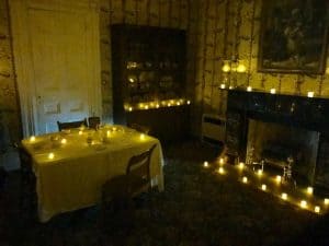 a room lit by candles