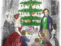 Colored engraving of a family in old-fashioned clothes standing around a decorated Christmas tree on a table.