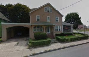 multi-story house with an attached garage