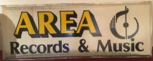 Outdoor sign for Area Records