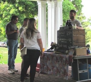 people standing around a table 