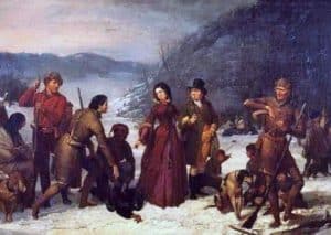 a woman and several men on a turkey hunt in the winter