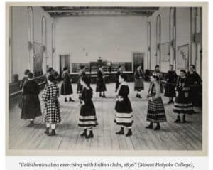 young ladies walking in a large circle