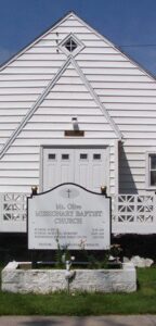 White Church With Mt. Olive Missionary Baptist Church Sign