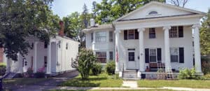 Two White Greek Revival Houses With Columns