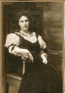 Photo of a woman seated in a chair 