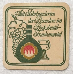 Coaster adverting Bocksbeutel wine in Germany