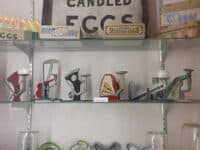 Various poultry paraphernalia displayed on shelves