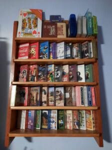 Playing cards displayed on  shelves