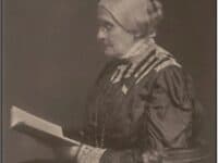 Susan B. Anthony (woman seated reading a book)
