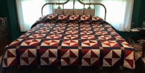 Broken Dishes Quilt on a bed