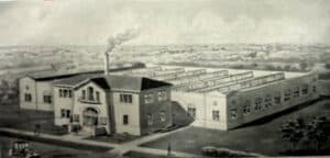 Two Story Building With Factory Circa 1935