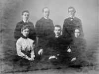 Family photo of McPadden Family - four men and three women