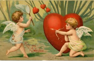 Valentine postcard with two cupids posing with a large heart