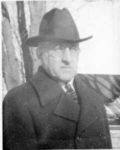 man in a coat and hat