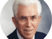 Man With White Hair And Glasses