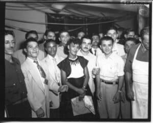 group of Puerto Rican Comstock Canning Co. workers at a goat dinner in 1953