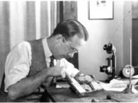 Norman Kent working on a woodcut