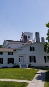 man working on the belevdere at Rose Hill.