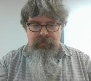 Man with glasses and long beard