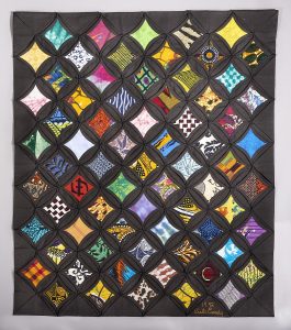 quilt with colored diamond shapes
