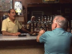 two men at a bar