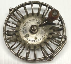 Photo of a open design fly fishing reel