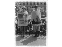 Miss Goldie Dunn and Miss Louise Hiatt, of the National Council for the Prevention of War, holding isolationist posters.