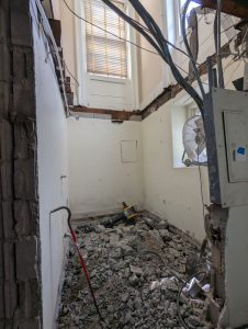Ceiling and floor removed from a former bathroom in the Geneva History Museum