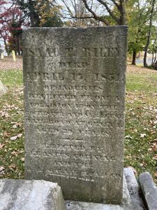 Cemetery stone for Isaac Riley with inscription about his 1851 death on the NYCRR.