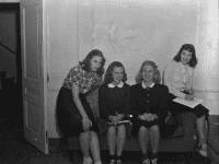William Smith Students sitting on a couch