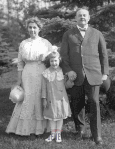 The Herendeen Family - mother and father with daughter
