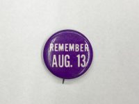 Pin "Remember Aug. 13) printed on it.