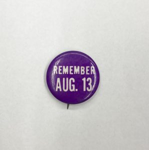 Pin "Remember Aug. 13) printed on it.